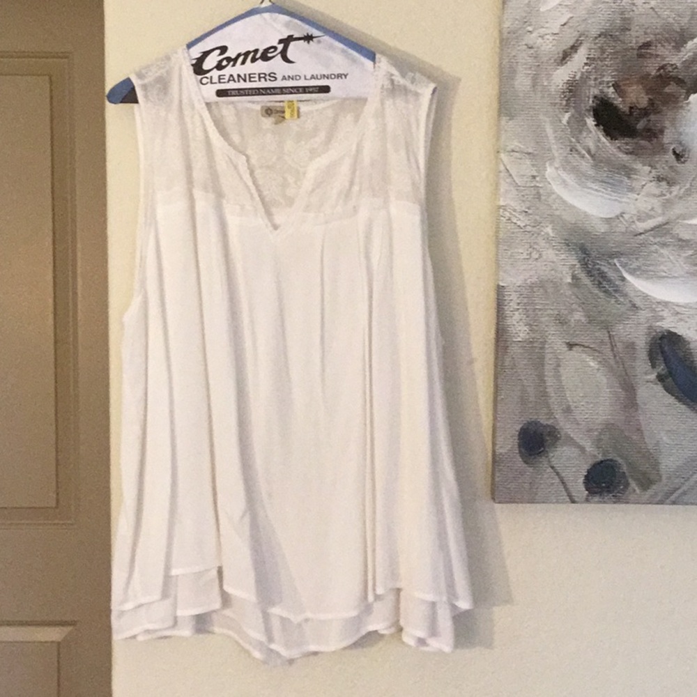White Sleeveless Blouse
